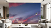 Floral cloudscape wall mural with blush pink and blue tones