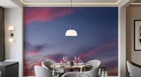 Pastel floral wall mural with dreamy cloud filled backdrop