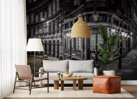 Urban street scene wall mural with warm architectural lighting