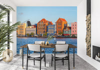 Tropical harbor wall mural featuring vibrant seaside architecture