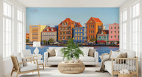 Waterfront wall mural showing bright harbour homes and reflections