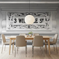 Architectural wall mural featuring monochrome carved stone design