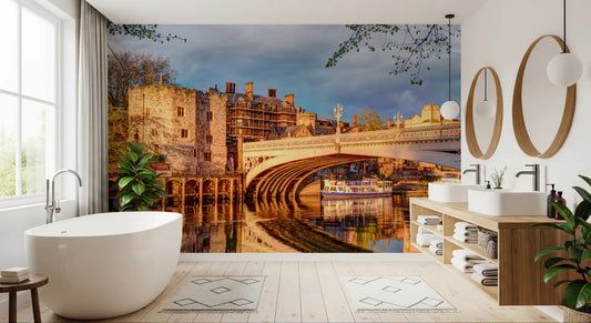 Historic riverfront wall mural featuring glowing evening lights
