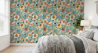 Watercolor flower wallpaper featuring soft teal foliage accents

