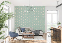 Repeating drops appear on a Mid Century wall mural in a living room