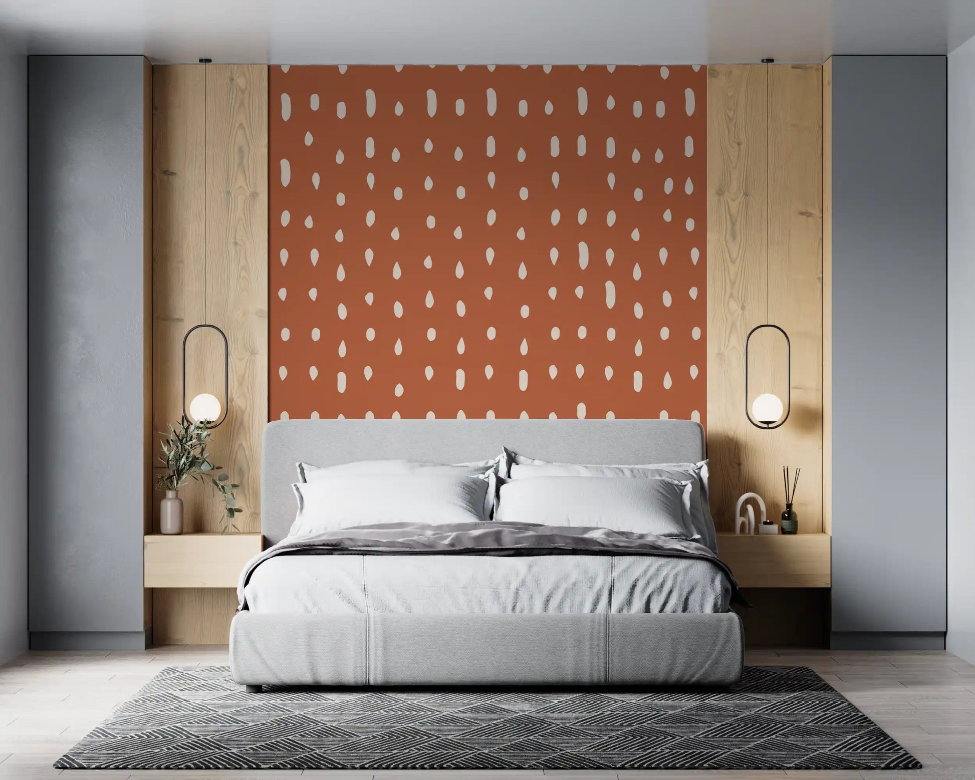 Burnt rust holds rows of ivory teardrops, a quiet repeat in the Seed Dots wall mural.