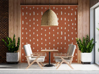 Pattern stretches floor to ceiling in a hallway via the Seed Dots wall mural.