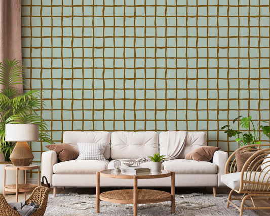 Mid Century Wavy Grid Soft Sage wallpaper warms a relaxed living room.