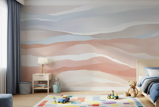 Painterly bands of blue and terracotta ripple the dunes wall mural in a kids bedroom.