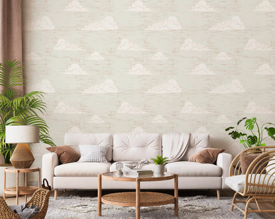 Ivory clouds and tiny birds drift over a living room in this Cream Cloud Sky wallpaper.