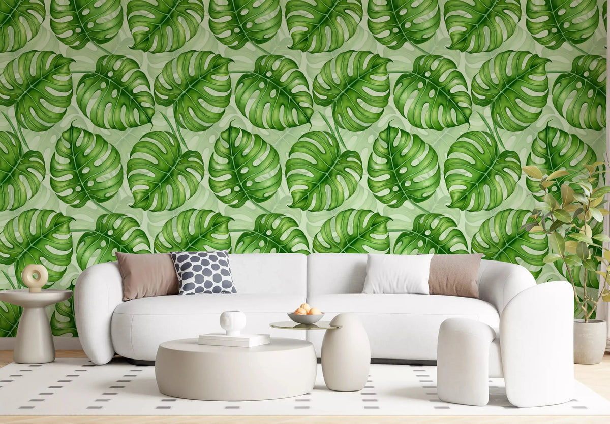 Green monstera leaves in watercolour behind a living room, tropical wallpaper GD10800