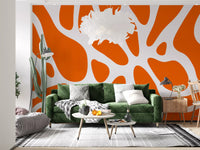 Organic orange cutouts scattered over a white wall mural, GD10806
