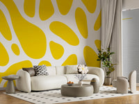 Curved yellow forms scatter across a relaxed lounge in this abstract wall mural GD10807
