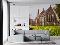 Sunlit Country Church with Spring Daffodils Wall Mural
