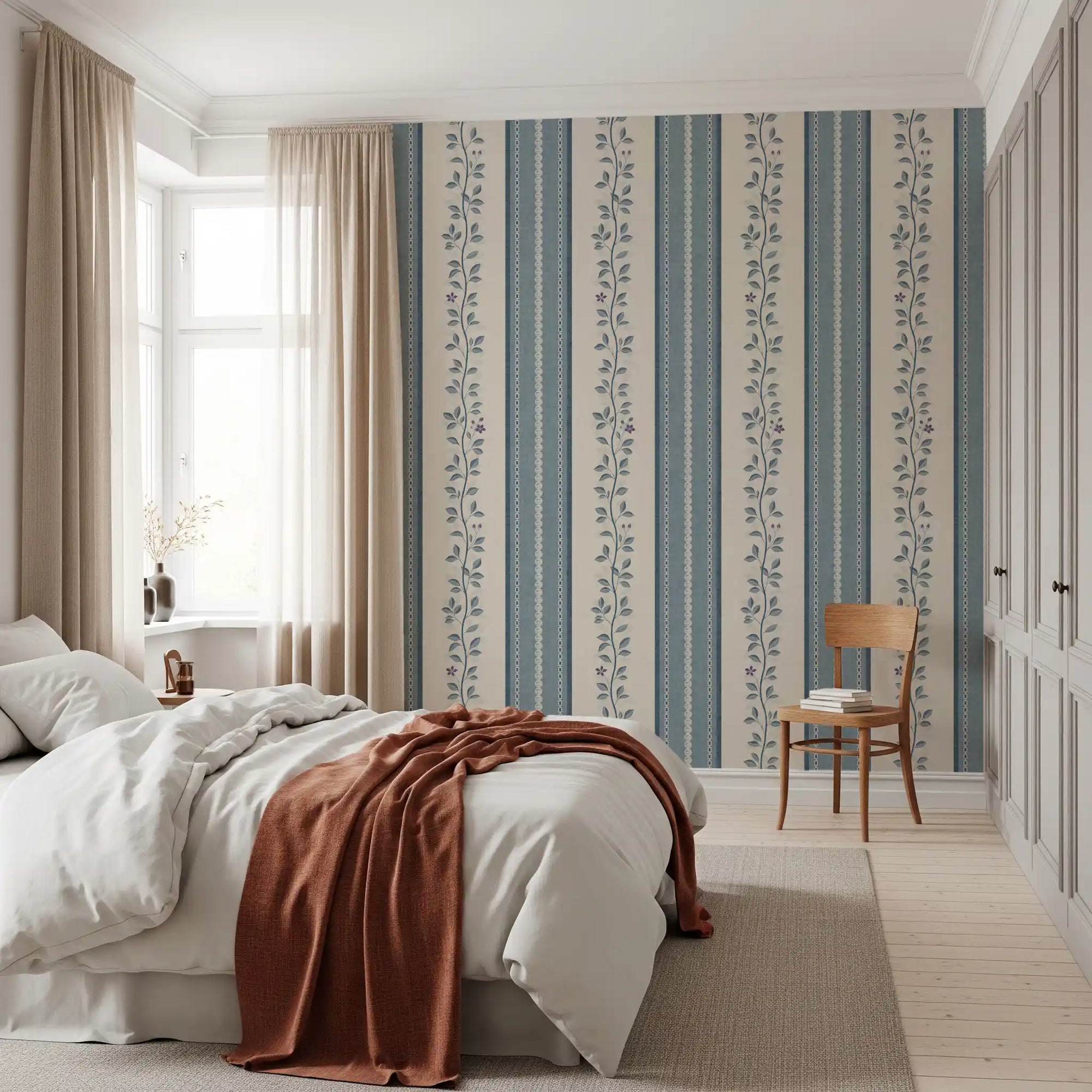 Bedroom styled with the coastal slate blue vine stripe wallpaper GD10965
