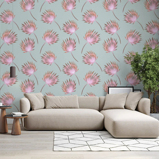 Blush palm frond wallpaper spreading across an open living room, GD11050
