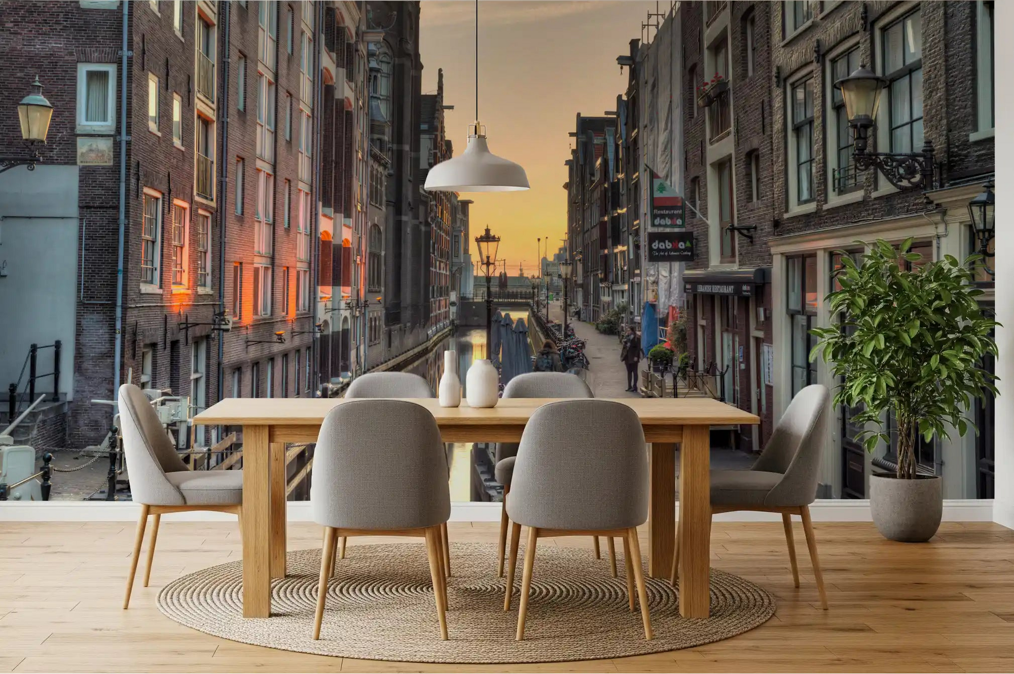 Warm Amsterdam canal wall mural lighting a dining room at dusk GD11148