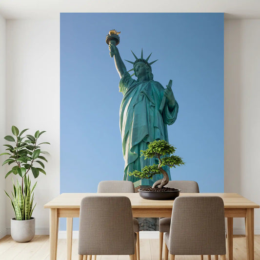 Green statue and blue sky open a dining room wall mural GD11386
