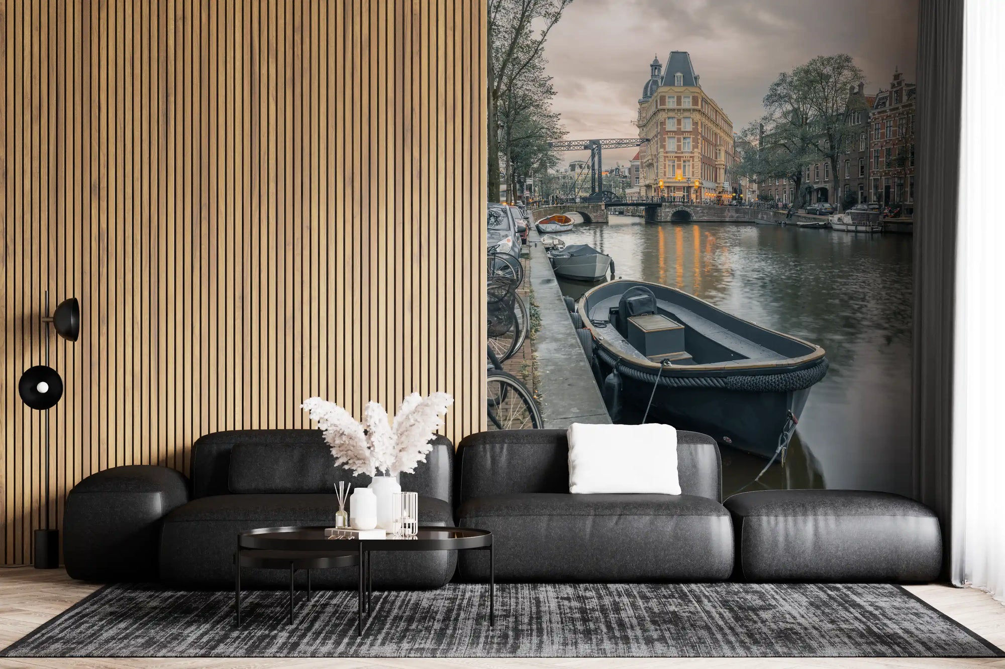 Dutch canal boat glows at evening behind a living room wall mural GD11420