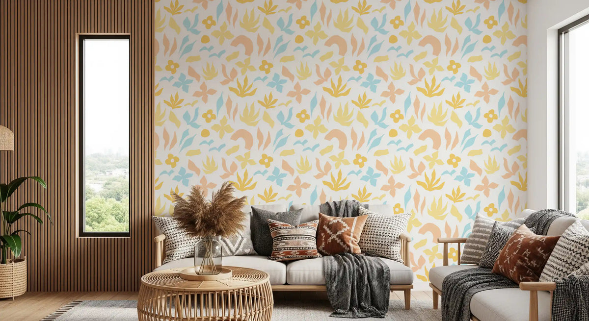 Pastel fronds scatter across the wallpaper in a bright lounge GD11600