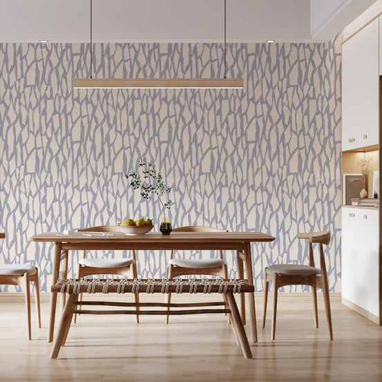 Grey stone fragment wallpaper runs behind a dining room in a calm neutral tone GD11675
