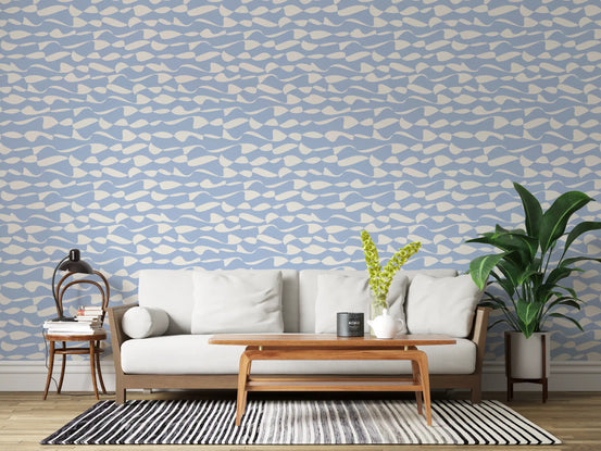 Cream swells drift over a living room in pale blue wallpaper, GD11977
