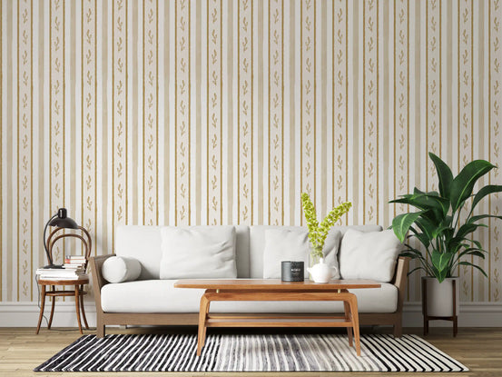 Living room glowing under golden leaf striped botanical wallpaper, GD12020
