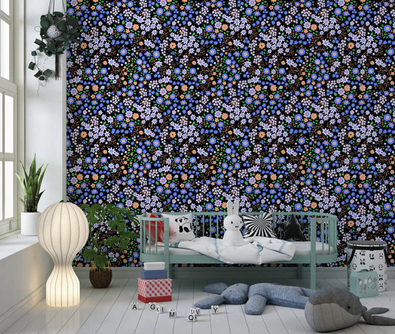 Ditsy blooms fill a kids' room in the Boho Garden Blooms wallpaper. GD12227