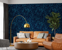 Marbled navy-and-teal motifs back a office area  on this Fluid Scribble wallpaper GD12242

