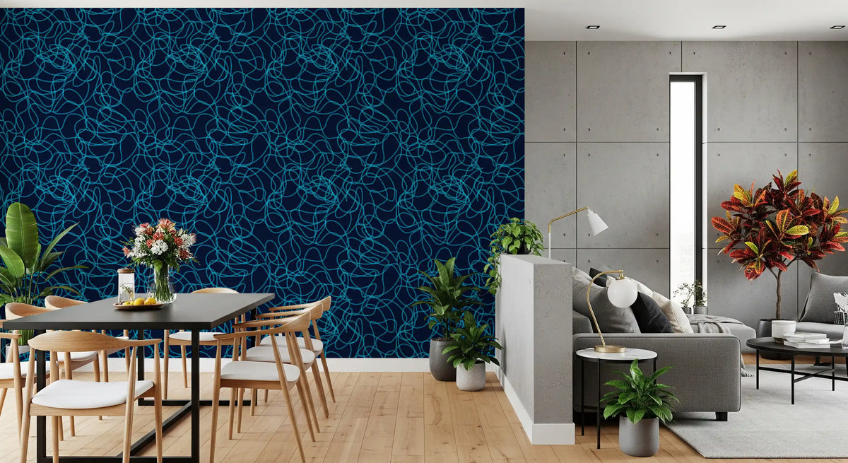 Rippling navy motifs fill a living and dining room in the Fluid Scribble wallpaper GD12242