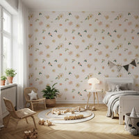 Meadow wallpaper in a kids room with a rattan chair, plant and wooden toys GD12281