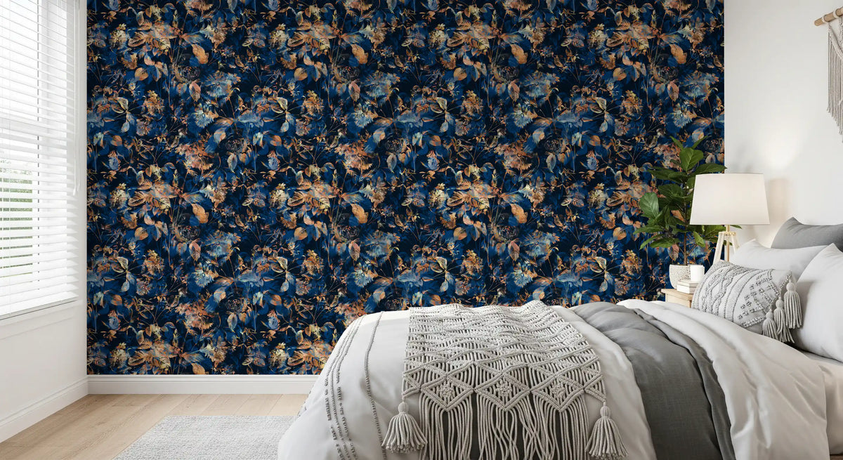 Dark botanical wallpaper in a bedroom with grey bedding and a macrame throw GD12284