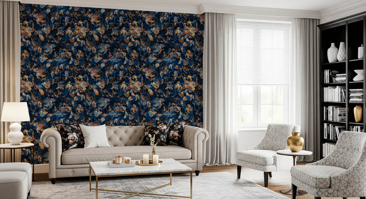 Dark botanical wallpaper in a living room with a chesterfield and bookshelf GD12284