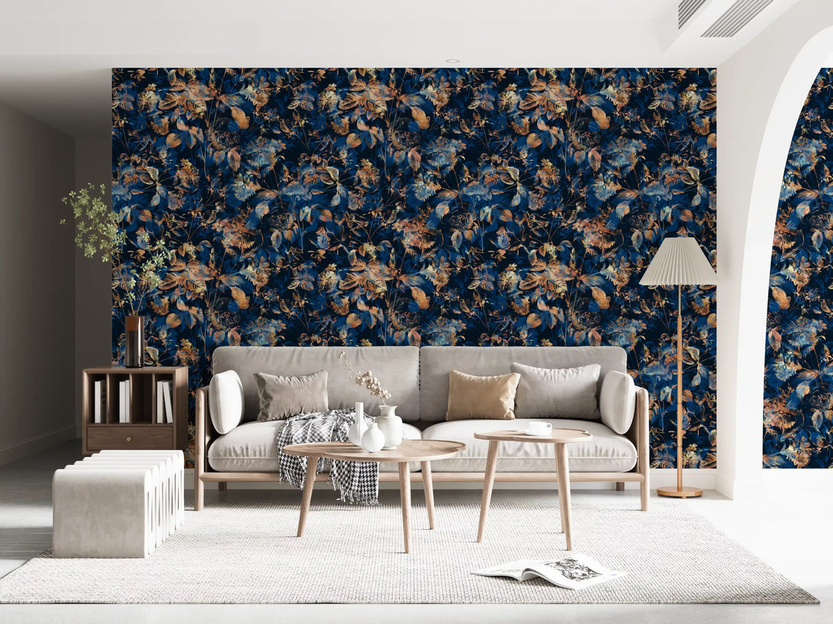 Navy botanical wallpaper in a living room with a cream sofa and floor lamp GD12284