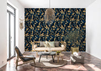Midnight flora brushwork wallpaper in a sunny lounge with a black chair and cream bench GD12288
