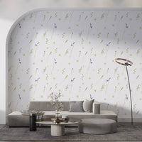 Pressed grasses wallpaper behind a grey sofa in an arched living room alcove GD12291