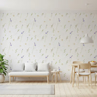 Pressed grasses wallpaper behind a white loveseat and wood dining table in a living room GD12291