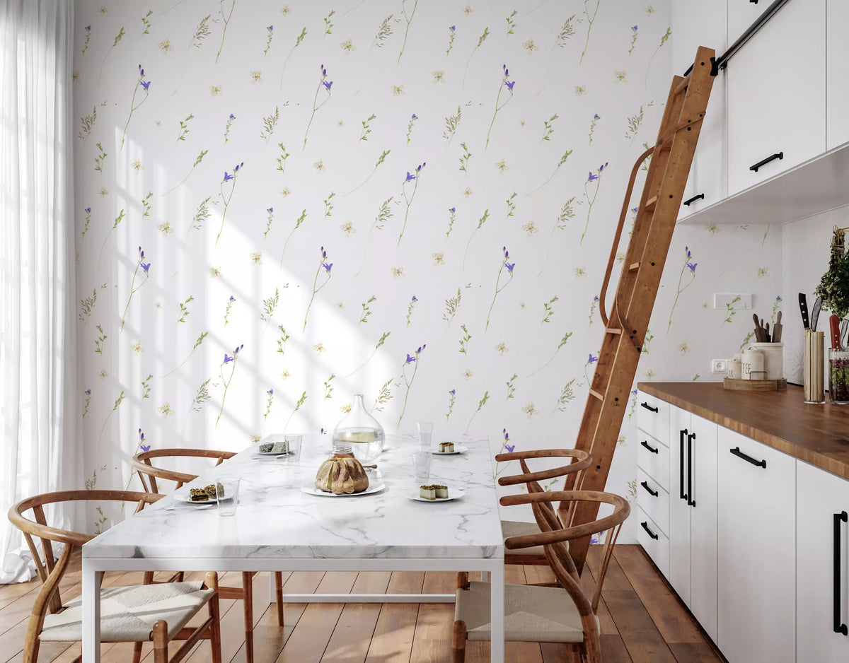 Botanical grasses wallpaper in a kitchen diner with a marble table and library ladder GD12291