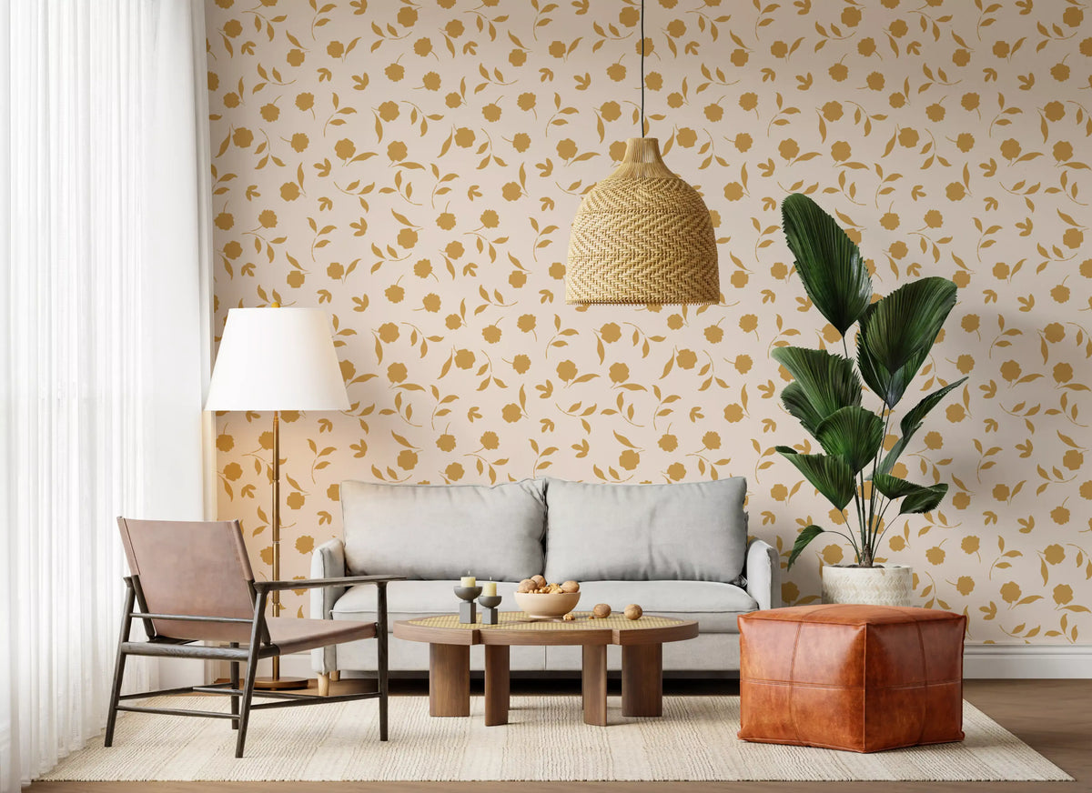 Gold floral sprigs wallpaper in a living room with grey sofa and tall leafy plant GD12304