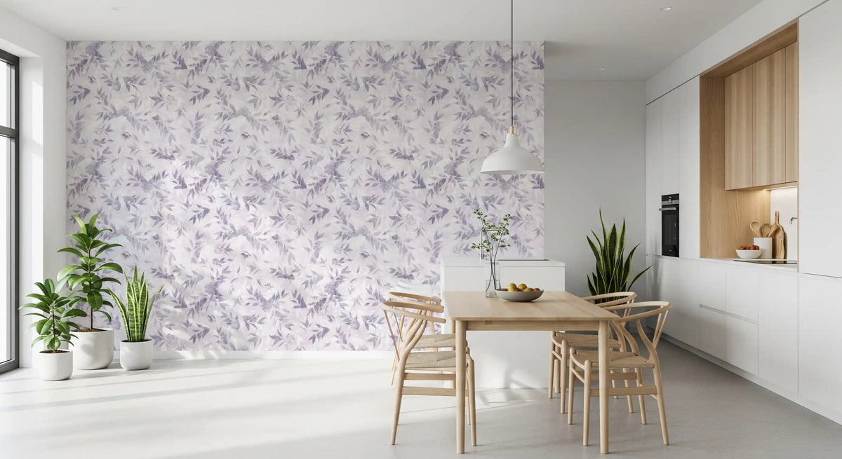 Muted lavender botanical leaf trail wallpaper in a white dining nook with a wood table GD12335