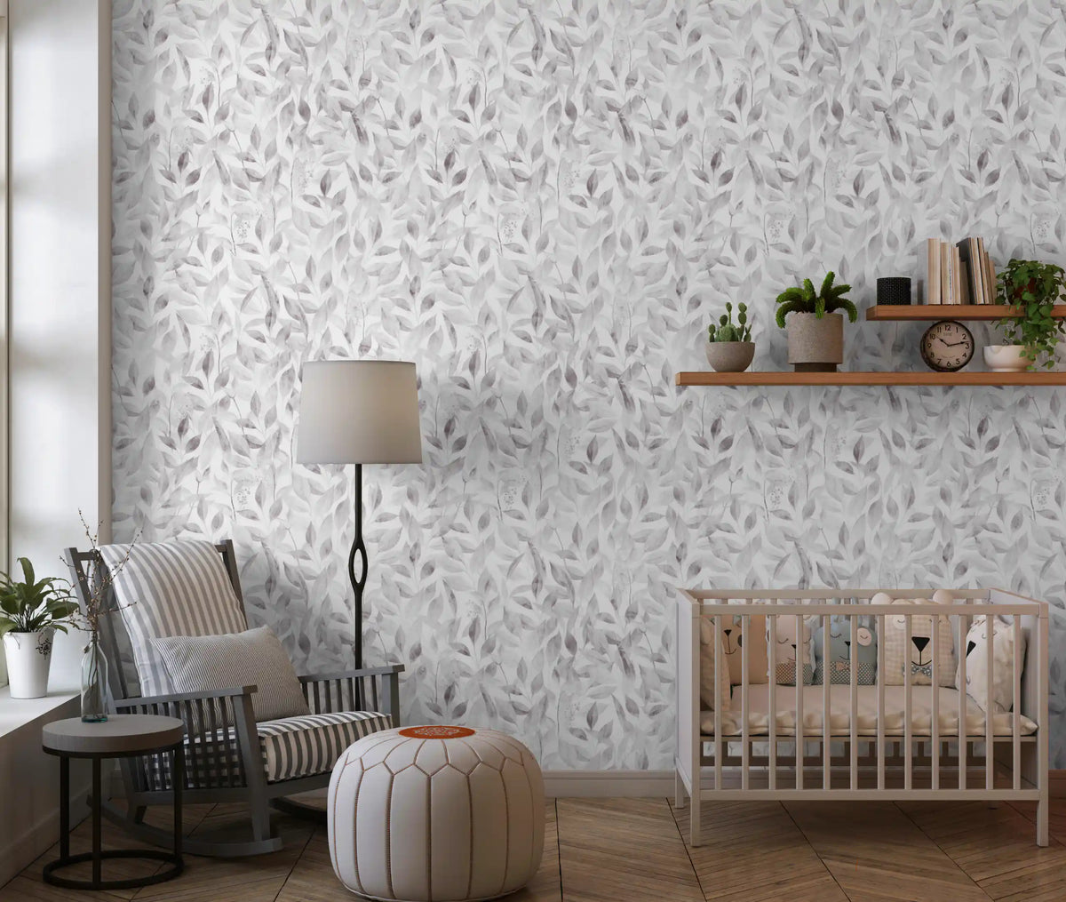 Grey botanical foliage wallpaper in a nursery with a wood crib and reading armchair GD12337