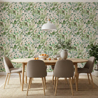 Soft sage floral meadow wallpaper in a dining room with a wood table and taupe chairs GD12339