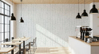 Textured Vertical Leaf wallpaper calms a restful cafe area GD12359