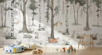 Misty woodland animal wall mural behind a play area with poufs, wooden toys and blocks GD12401