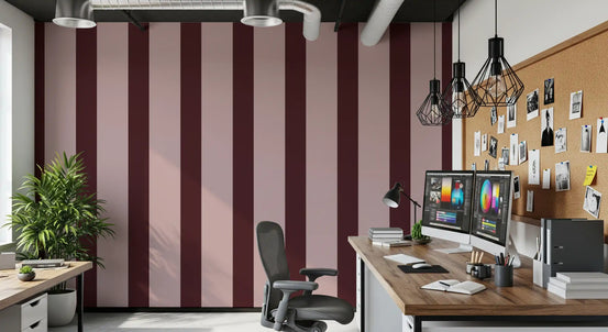Mauve and burgundy stripe wallpaper in a home office with a wood desk and black task chair GD12443