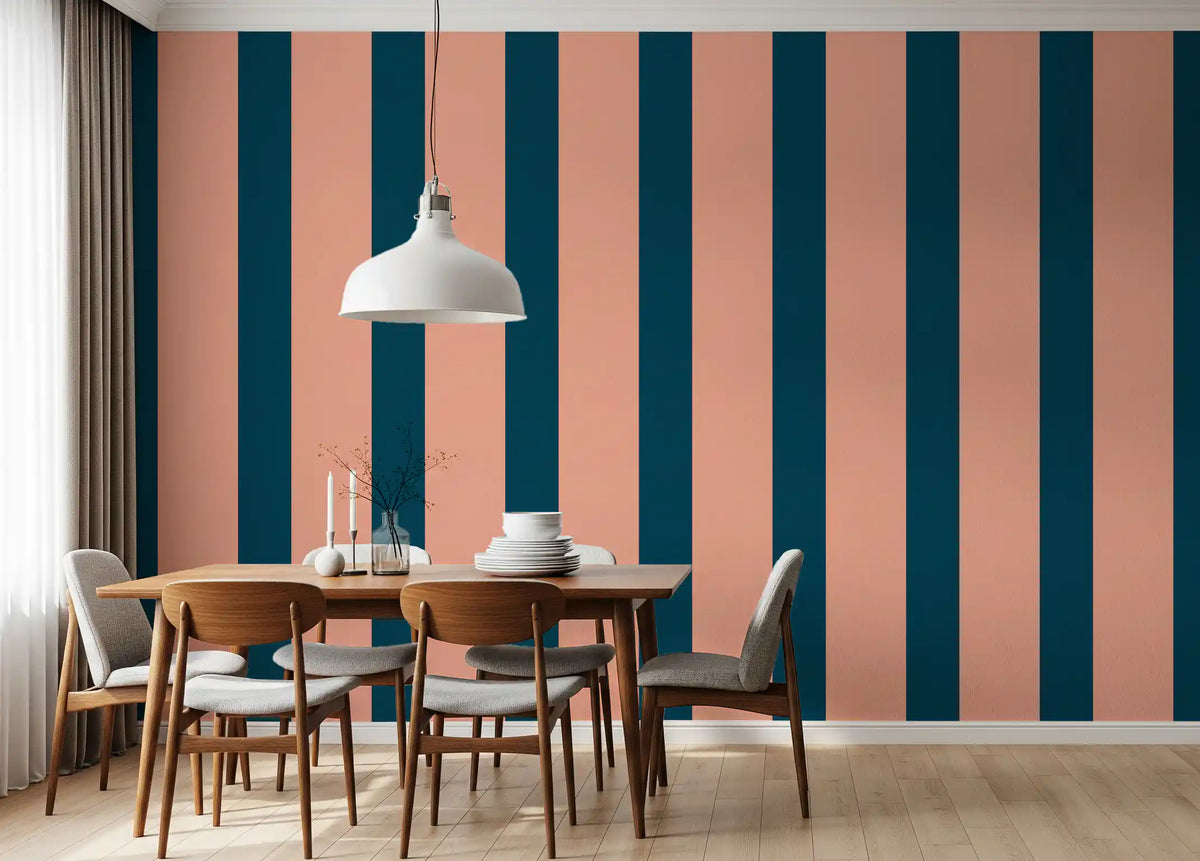 Peach and petrol striped wallpaper in a dining room with a wooden table and mixed chairs GD12445