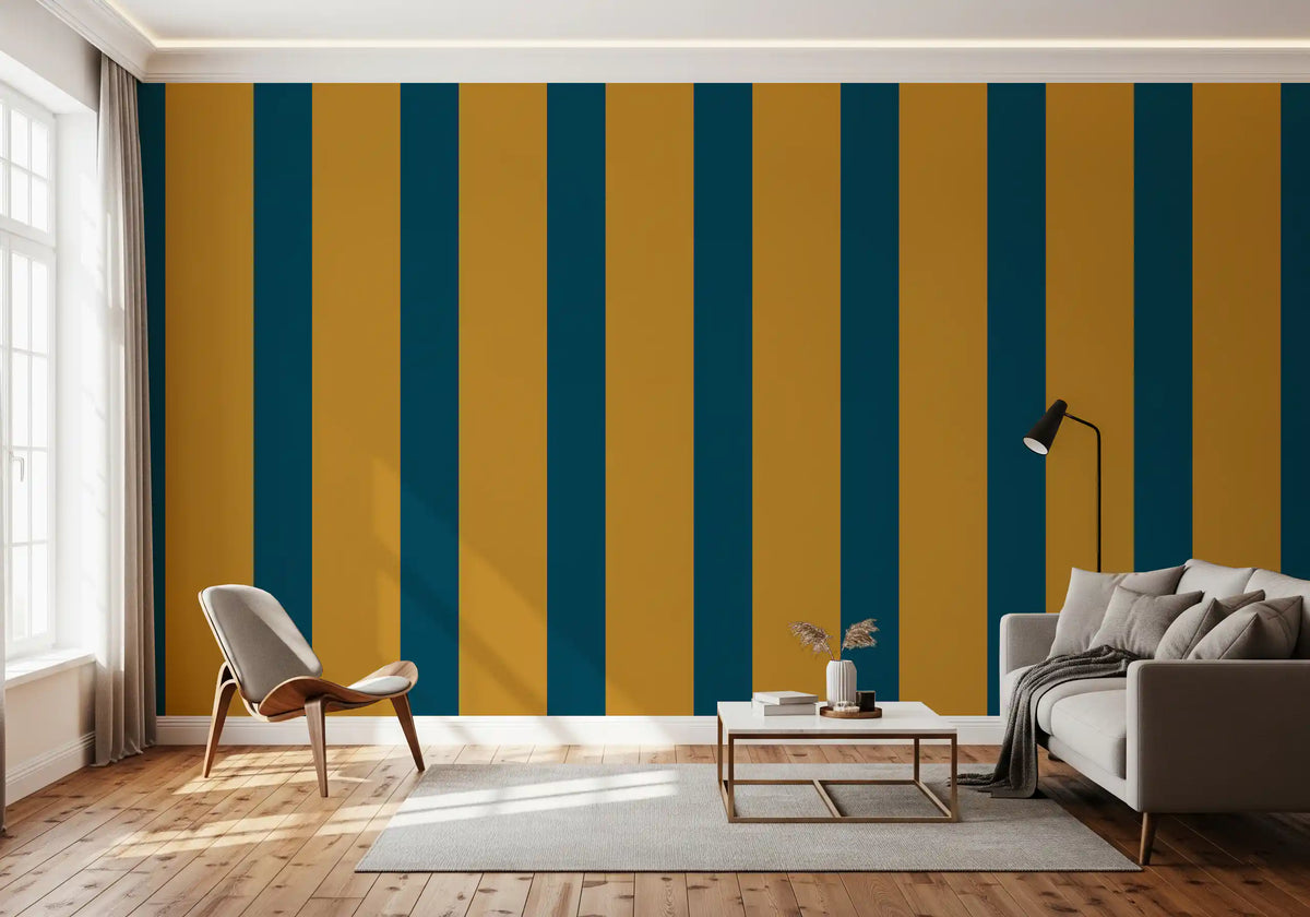 Teal and ochre striped wallpaper in a living room with cream chair and grey sofa GD12447