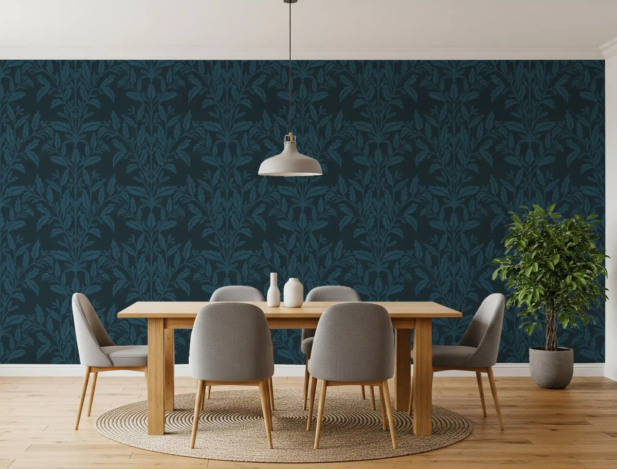 Teal leaf motif wallpaper in a dining room with wood table and grey chairs GD12456