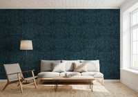 Teal leaf motif wallpaper in a bright living room with white sofa and floor lamp GD12456