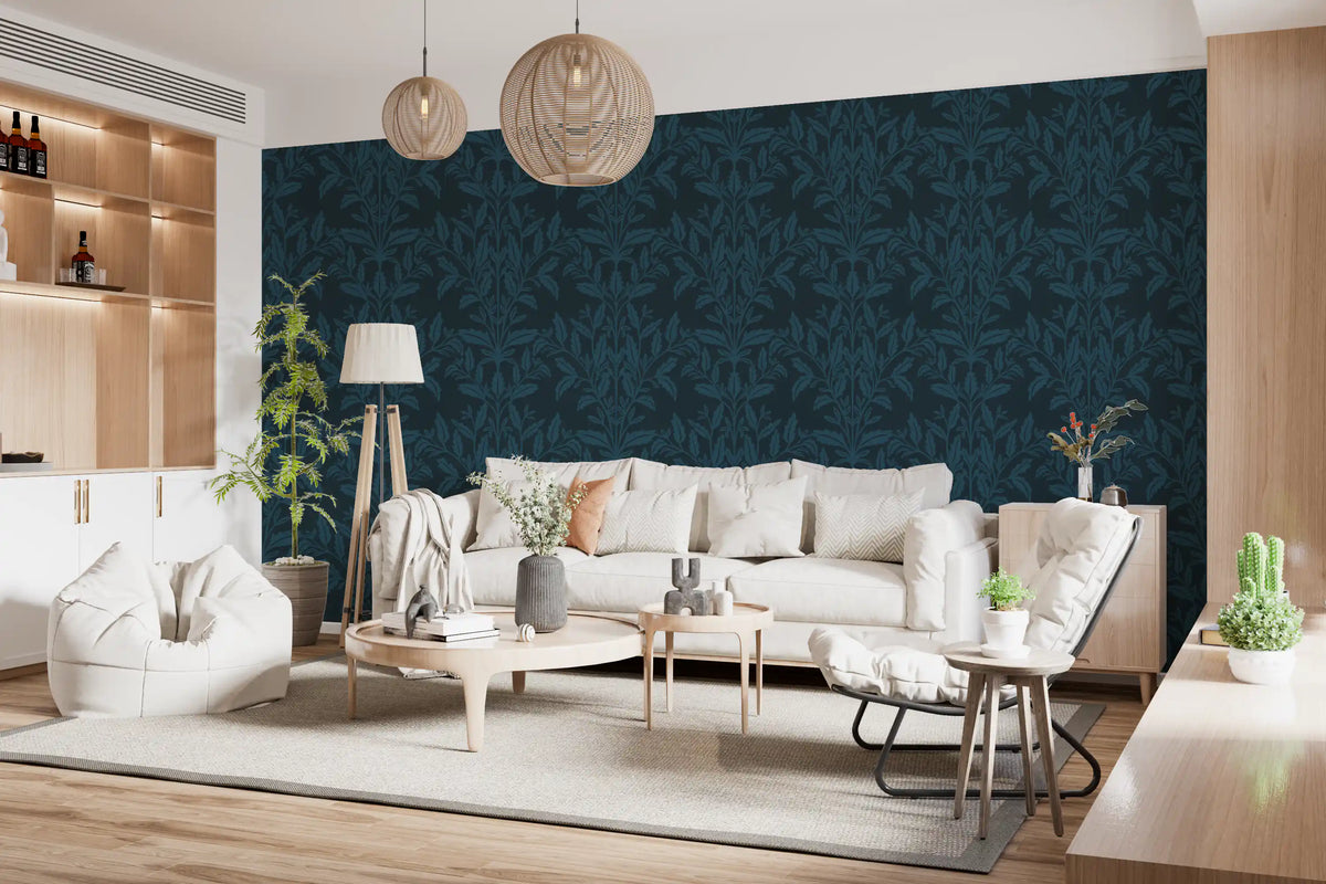 Dark teal leaf wallpaper in a living room with cream sofa and wood wine shelving GD12456